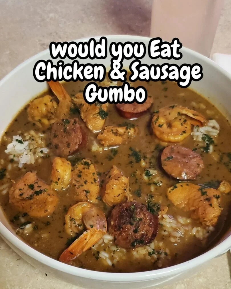 Bowl of Cajun Chicken and Sausage Gumbo garnished with green onions