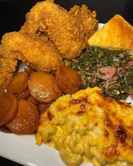 Mac n Cheese with crispy fried chicken served in a bowl