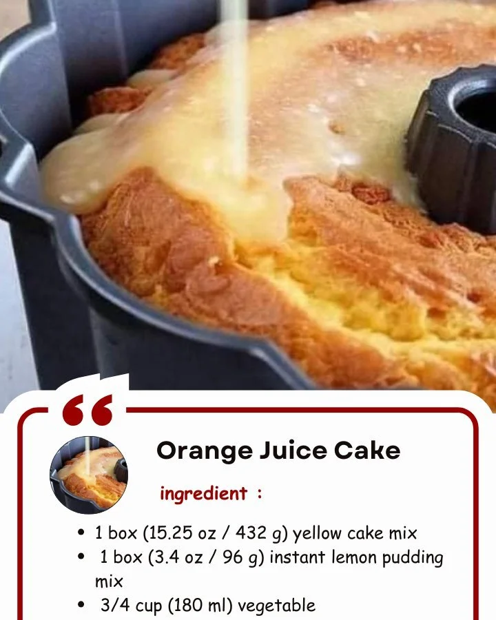 Moist orange juice cake topped with orange glaze on a white plate