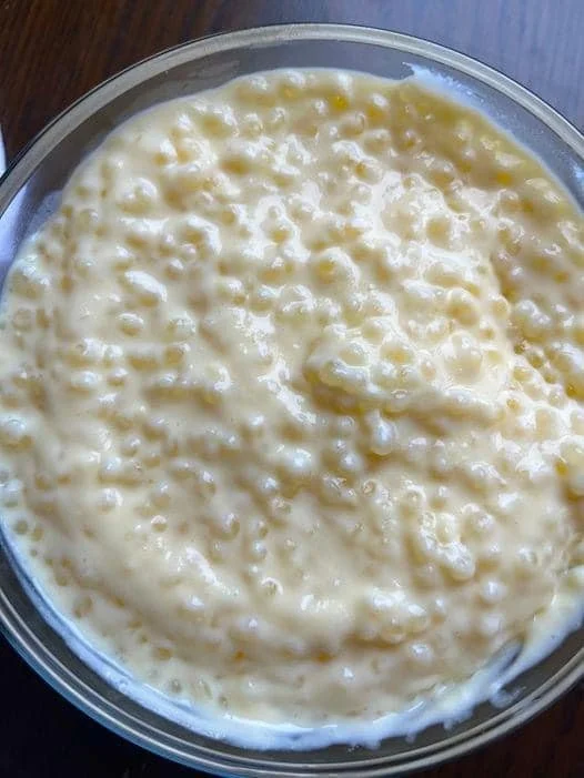 Delicious bowl of homemade tapioca pudding topped with fresh fruit