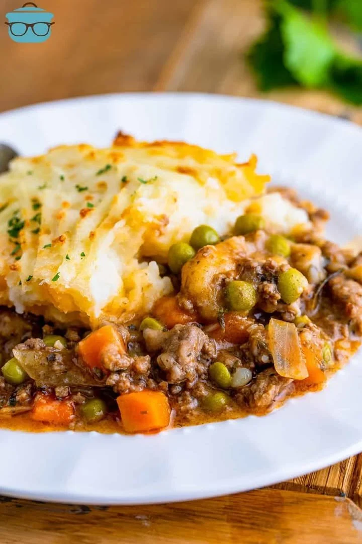 Delicious homemade Shepherd's Pie with golden mashed potatoes and savory meat filling.