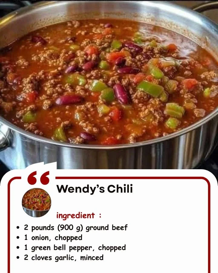 Bowl of Wendy's Chili topped with cheese and onions, served hot.